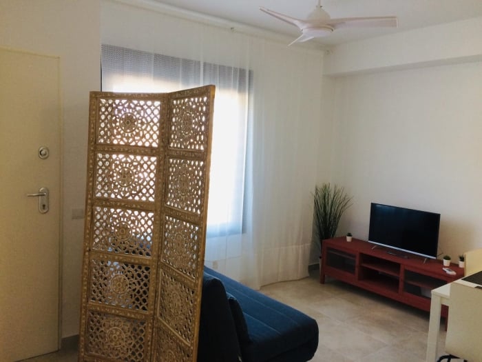 Apartamento en el pueblo con piscina y garaje