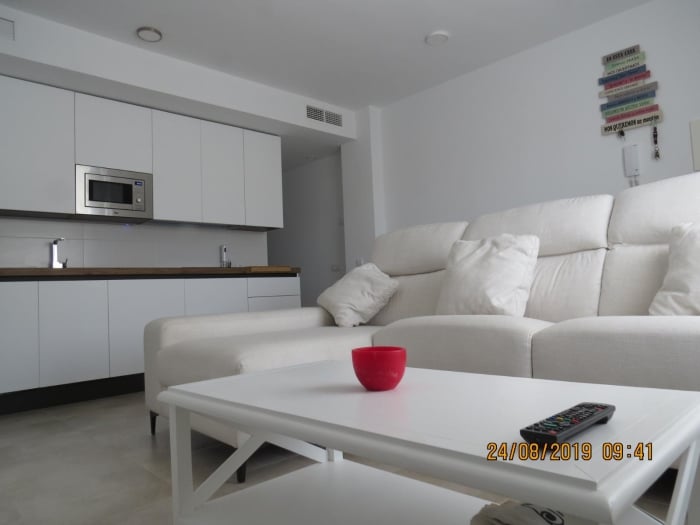 Apartamento en el pueblo con piscina y garaje