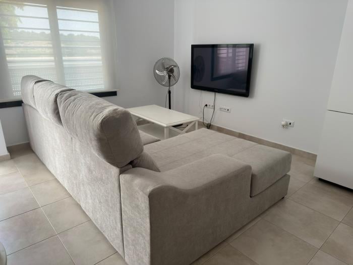Apartamento en el pueblo con piscina y garaje